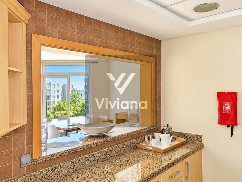 21 Modern Kitchen Pass-Through with Dining View. png