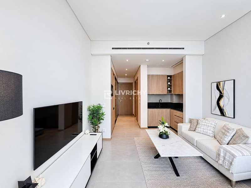 6 Minimalist Living Room with Open Kitchen. png