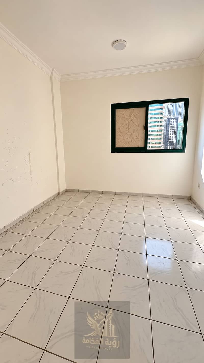 2 Sunlit Marble-Tiled Room with City View. png