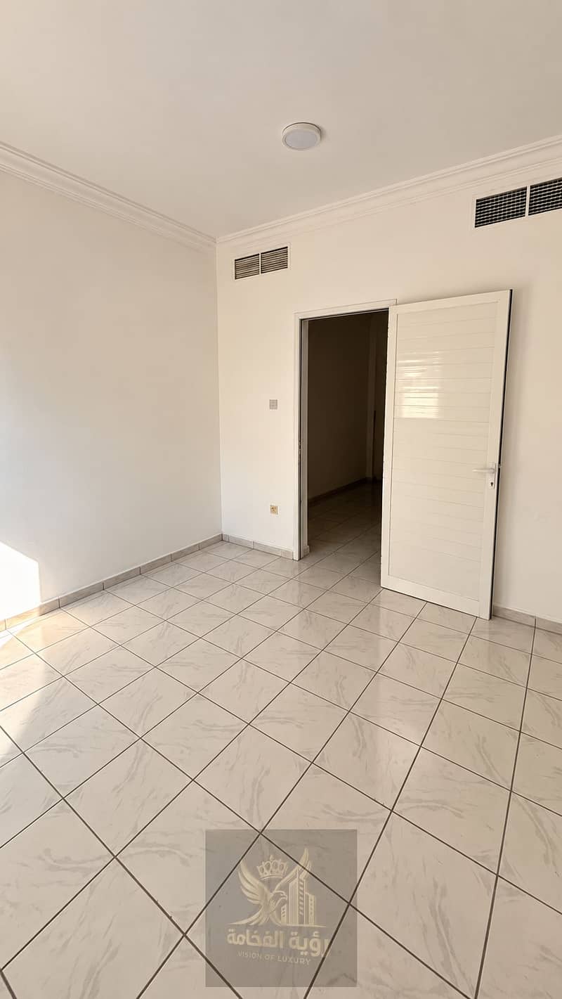 3 Minimal Marble-Tiled Room With Open Door. png