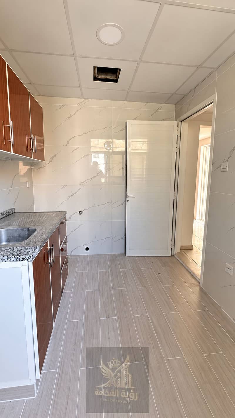 7 Modern Marble-Tiled Kitchen Utility Room. png