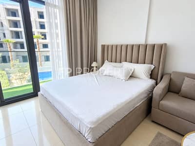 Studio de  à à louer à Jumeirah Village Circle (JVC), Dubai - Bright Modern Bedroom with Poolside View. png
