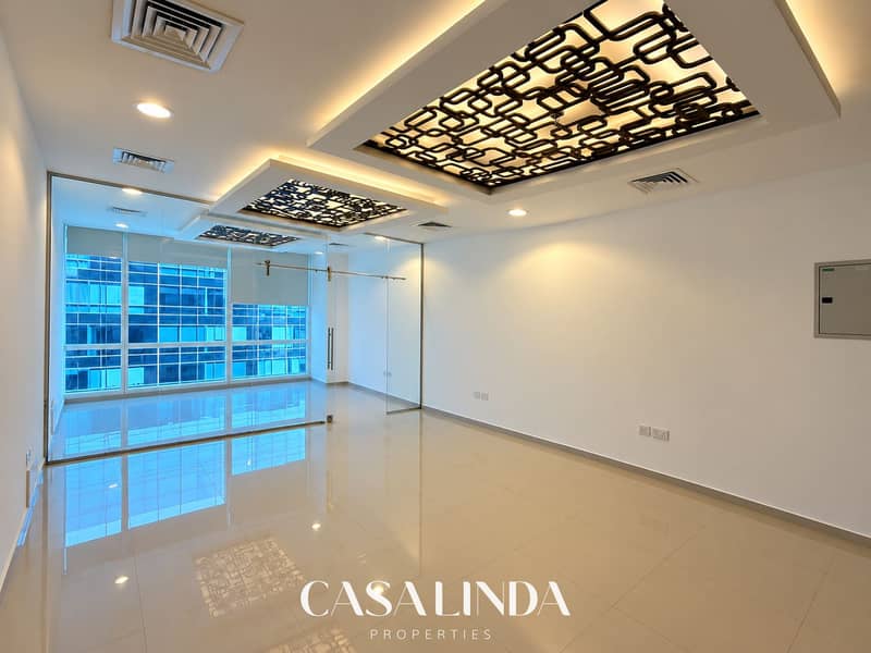 2 Modern Office with Geometric Ceiling Reflections. png