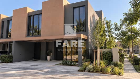 4 Bedroom Townhouse for Sale in Tilal City, Sharjah - Modern Townhouse in Sunny Suburban Development. png