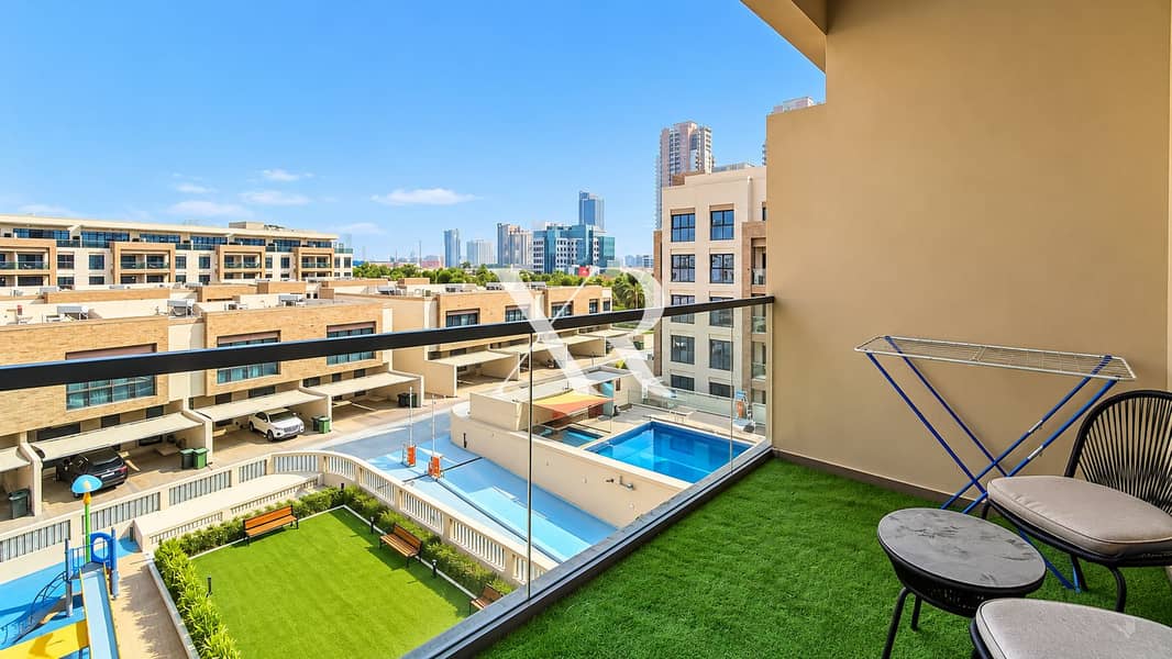 11 Balcony View Over Courtyard and Skyline. png