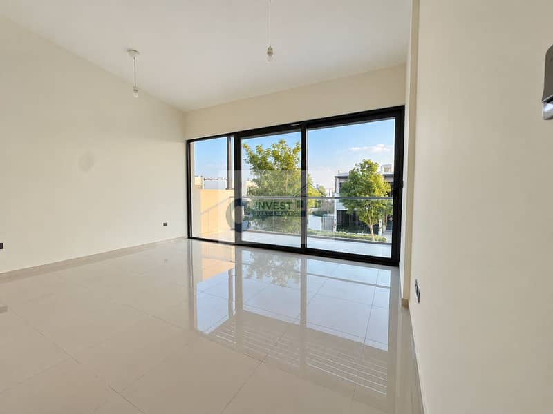 9 Bright Minimalist Room with Glass Balcony Doors. png
