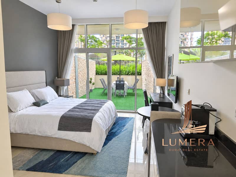 Bright Modern Studio Bedroom with Green Patio Views. png Bright Modern Studio Bedroom with Green Patio Views. png