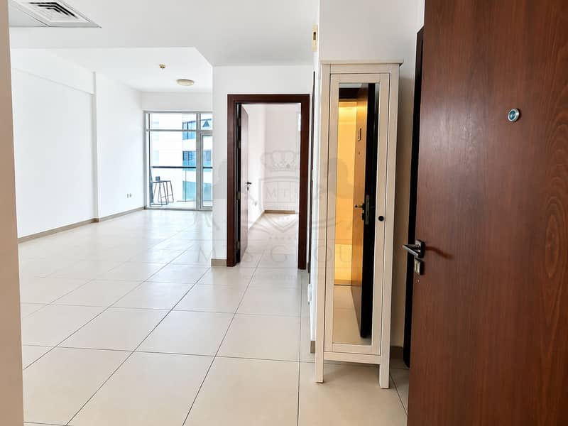 5 Bright Modern Apartment Entrance and Living Area. png