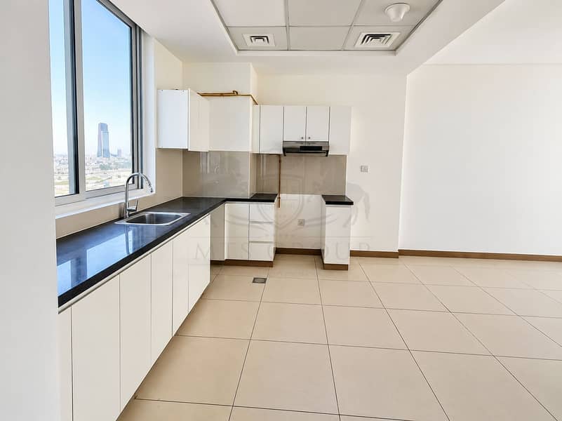 7 Bright Modern Apartment Kitchen With City View. png