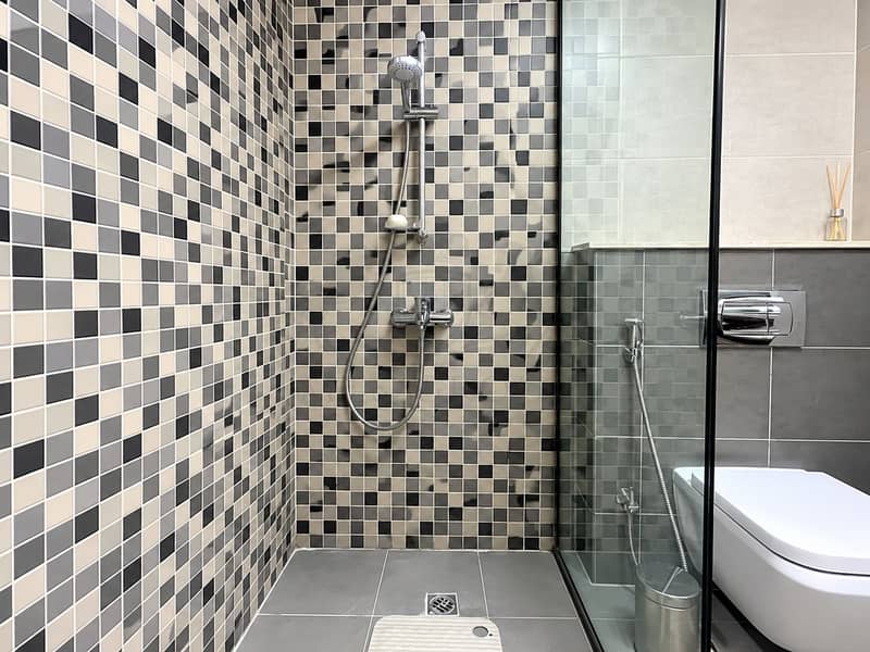 7 Modern Mosaic-Tiled Walk-In Bathroom. png