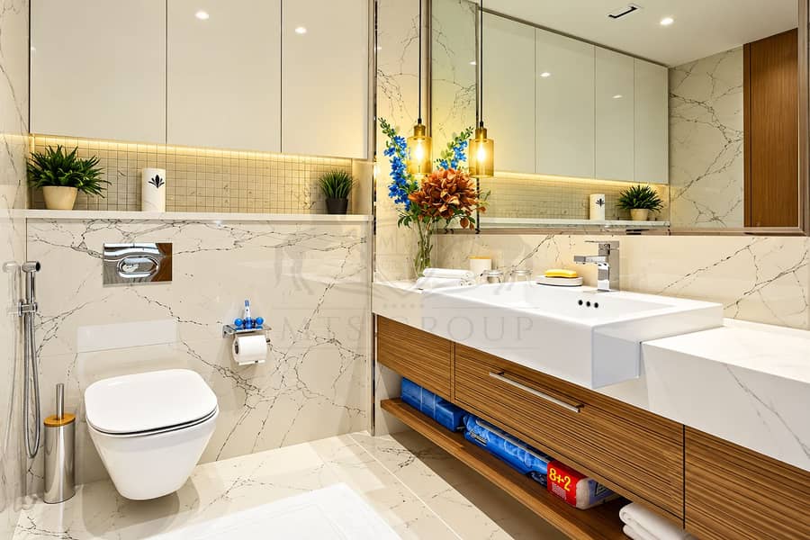 9 Modern Marble Bathroom with Warm Wood Vanity. png
