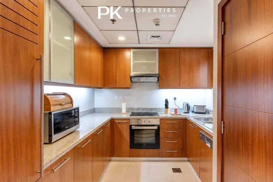 9 Dubai Mall 1BR Apartment with Balcony & Gym