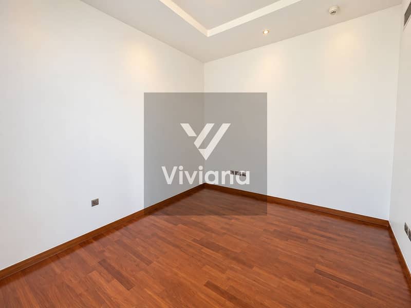 5 Minimal Modern Room with Warm Wood Flooring. png