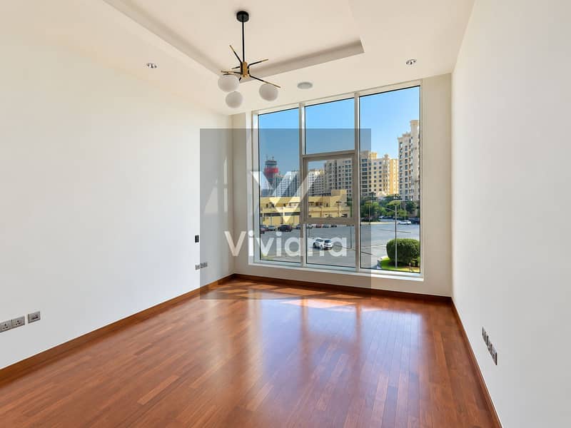 8 Sunlit Minimalist Room with Urban View. png