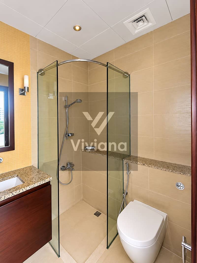 13 Modern Beige Tiled Bathroom. png