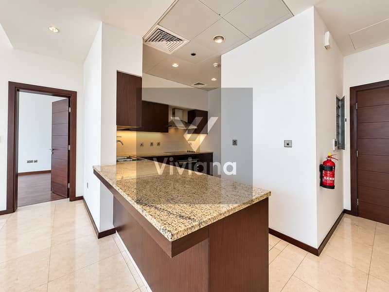 14 Modern Kitchen with Granite Breakfast Bar. png