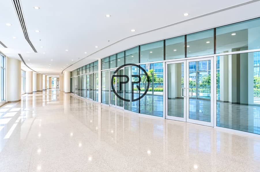 6 Modern Glass-Lined Commercial Corridor. png