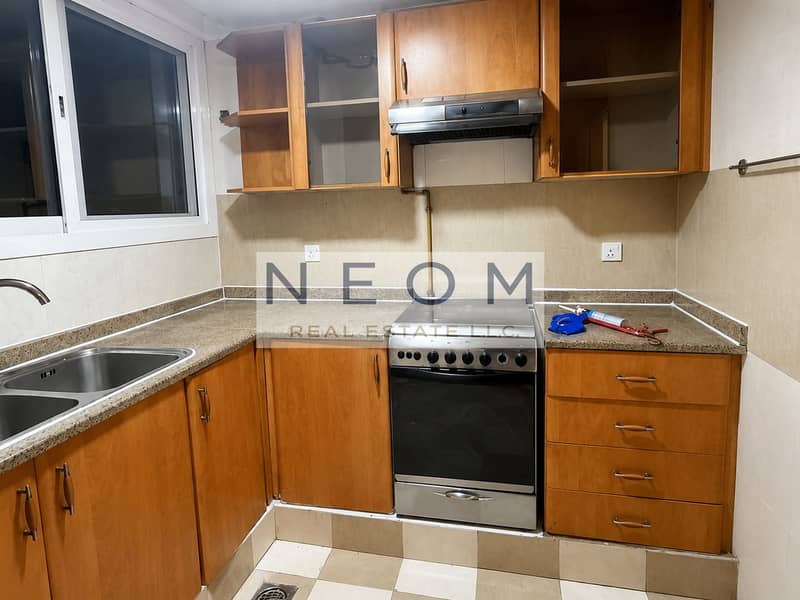 3 Warm Modern L-Shaped Kitchen. png