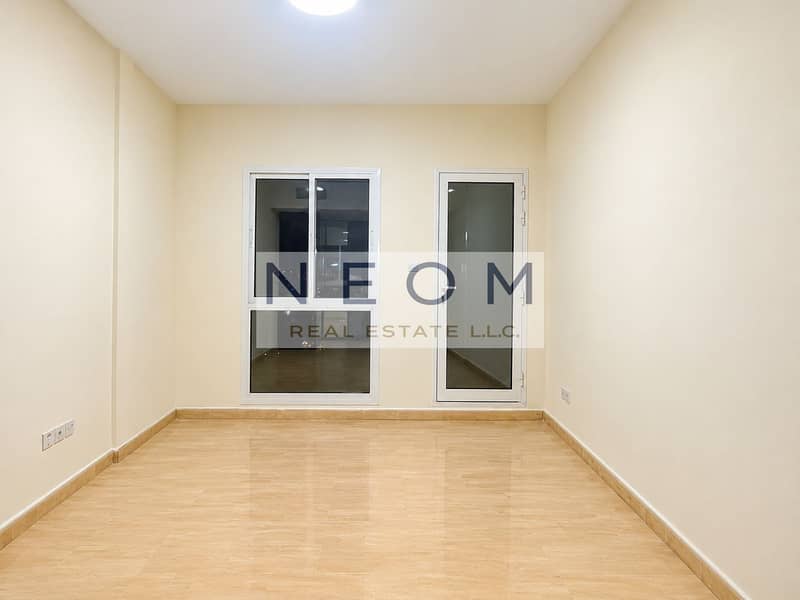 4 Minimal Beige Room with Window and Glass Door. png