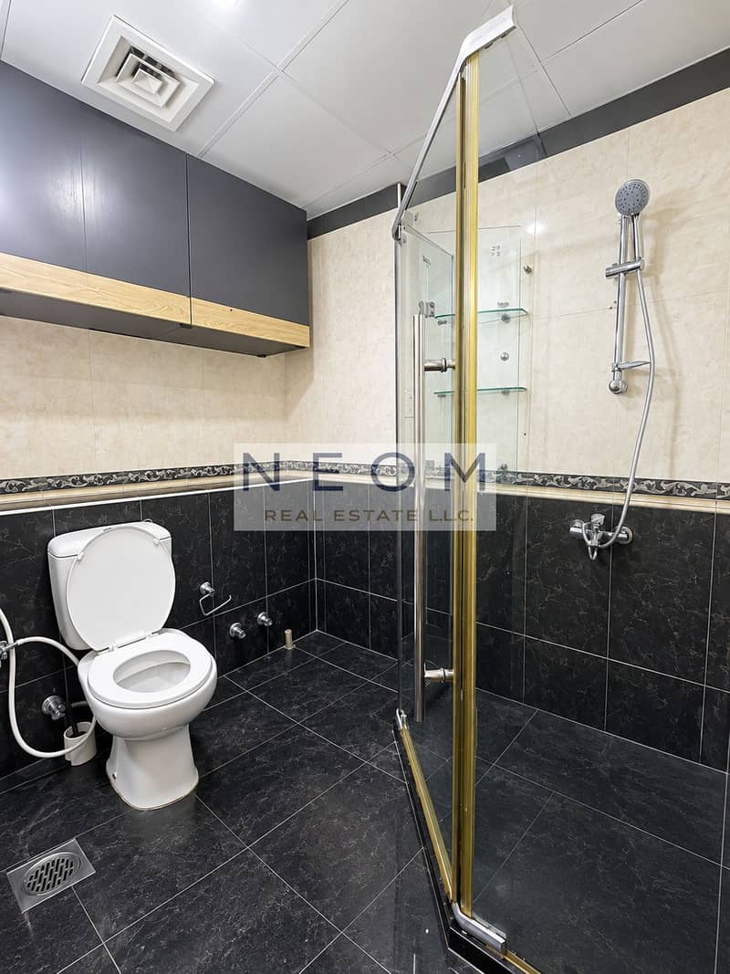 7 Modern Charcoal and Cream Bathroom. png