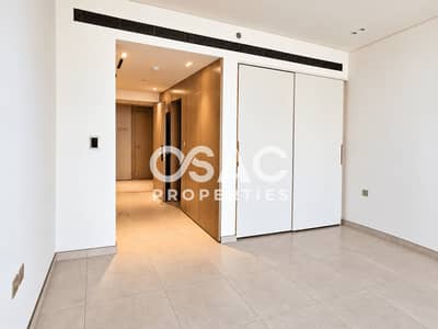 Studio for Rent in Dubai Healthcare City Phase 2, Dubai - Stylish City Living | Pool, Gym & Green Spaces
