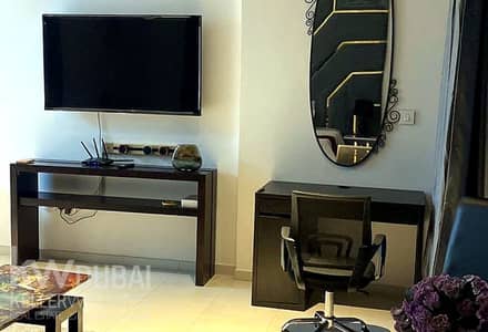 Monolocale in affitto a Business Bay, Dubai - enhanced_photo_7_tv_desk_area. png