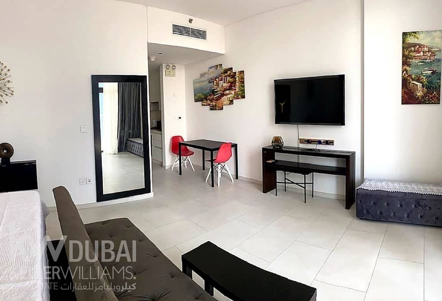 2 enhanced_photo_3_living_area. png