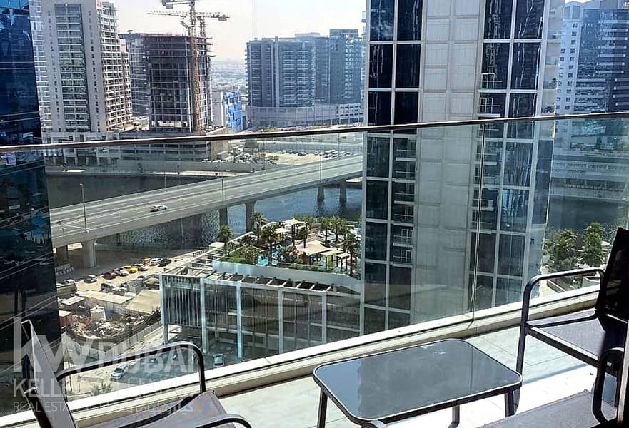 7 enhanced_photo_1_balcony_view. png
