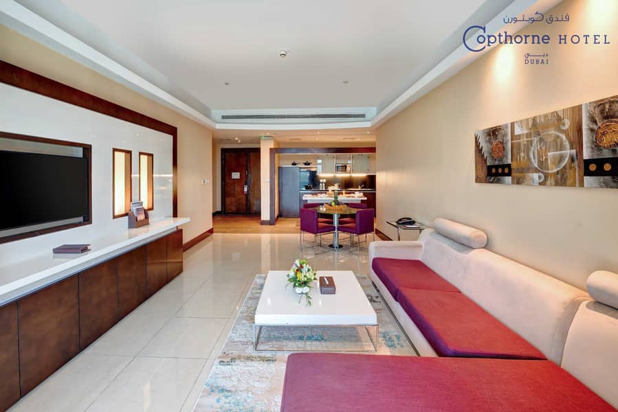 3 Executive Suite Creek View - Living Room. jpg