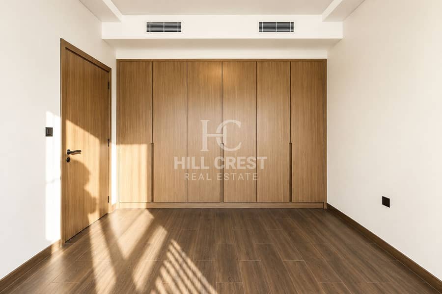 10 Sunlit Minimalist Bedroom with Built-In Wardrobe. png