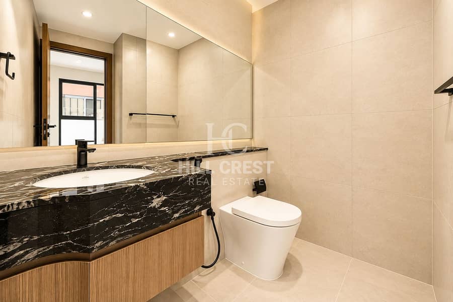 14 Warm Minimalist Marble Bathroom. png