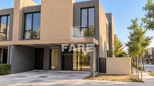 4 Bedroom Townhouse for Sale in Tilal City, Sharjah - Modern End-Unit Townhouse in Warm Daylight. png