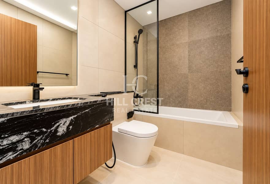 16 Modern Warm-Toned Bathroom Interior. png