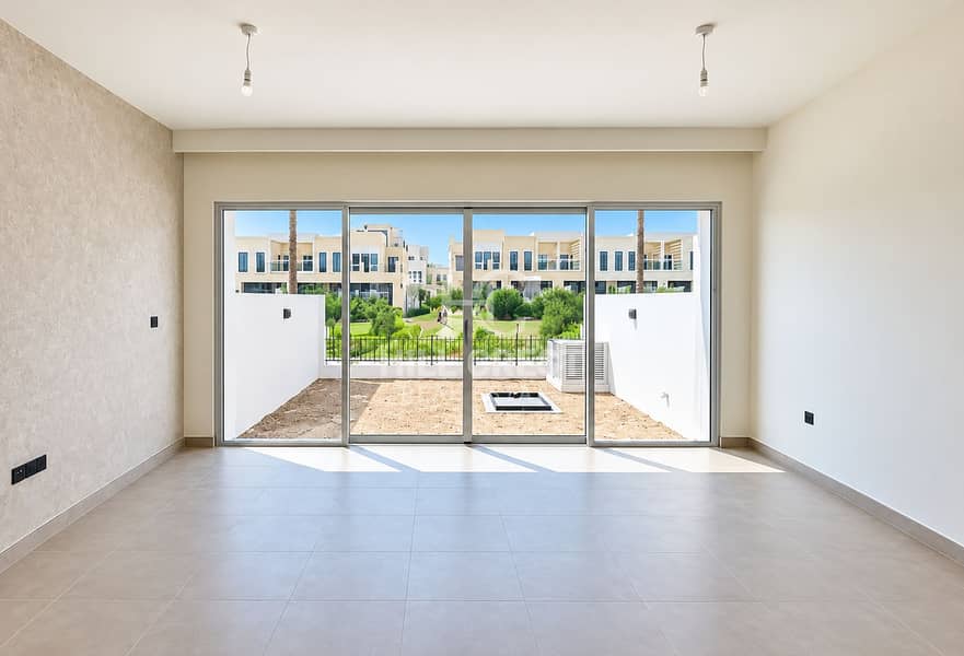 Sunlit Minimalist Room with Patio Views. png Sunlit Minimalist Room with Patio Views. png