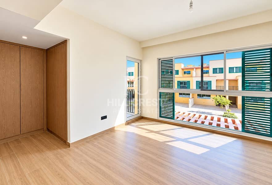 5 Sunlit Modern Bedroom with Courtyard Views. png