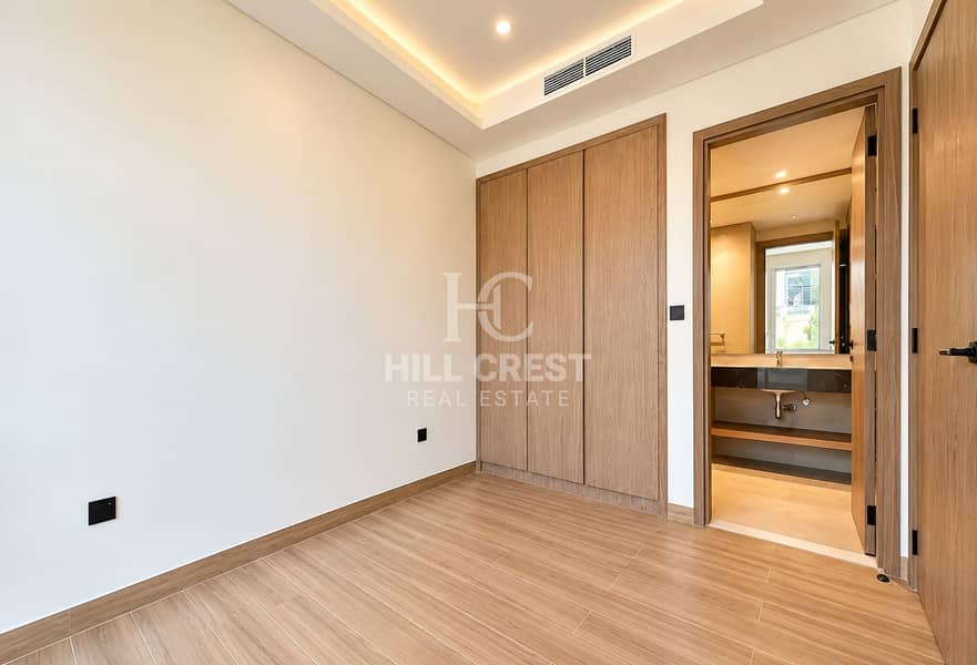 5 Modern Cream Bedroom with Open Bathroom. png