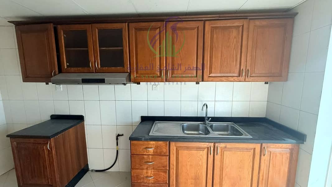 14 apartment-for-rent-3-bedroom-altaawn-alsharqh-kitchen-06. jpg