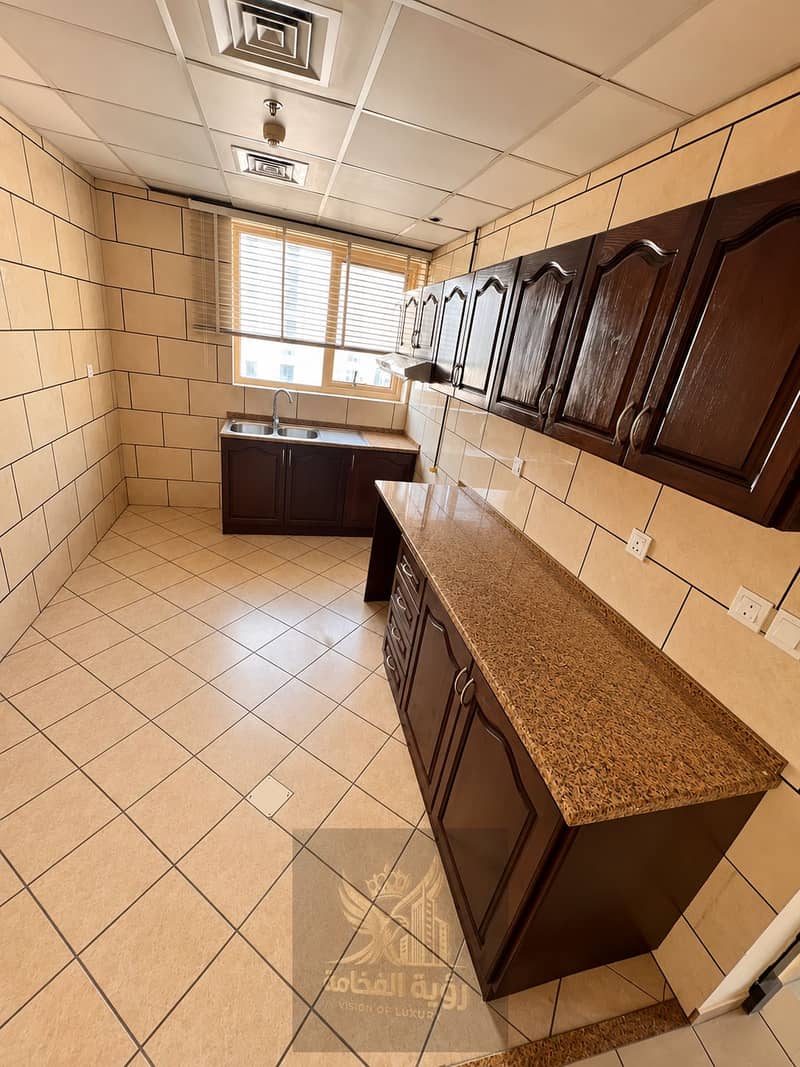 6 Clean Warm-Toned Galley Kitchen. png