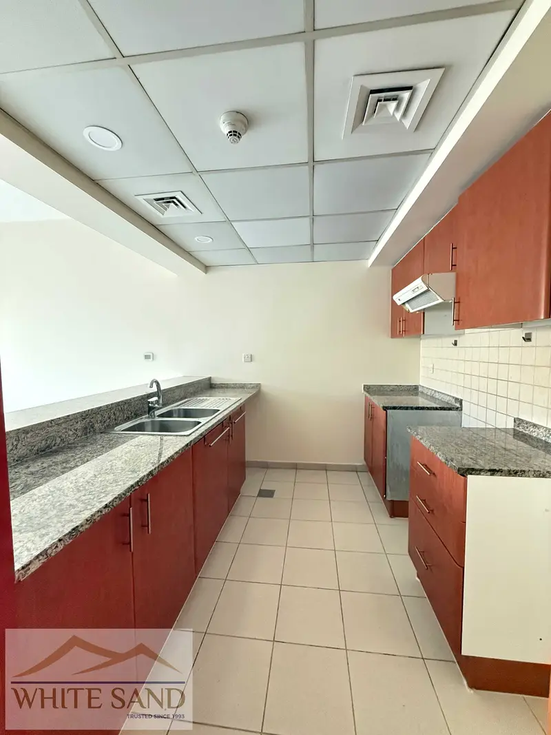 Spacious 1BR with Balcony in The Greens | Al Ghozlan 4