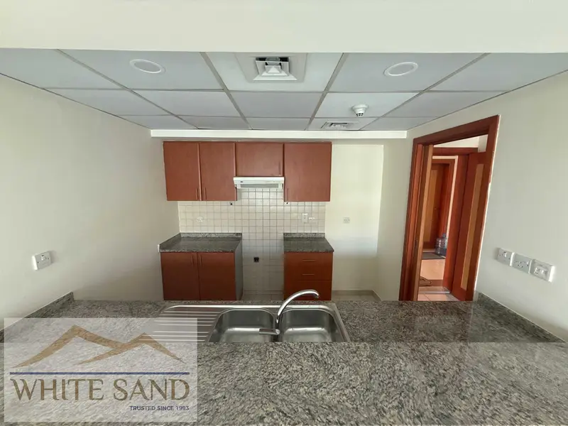 Spacious 1BR with Balcony in The Greens | Al Ghozlan 4