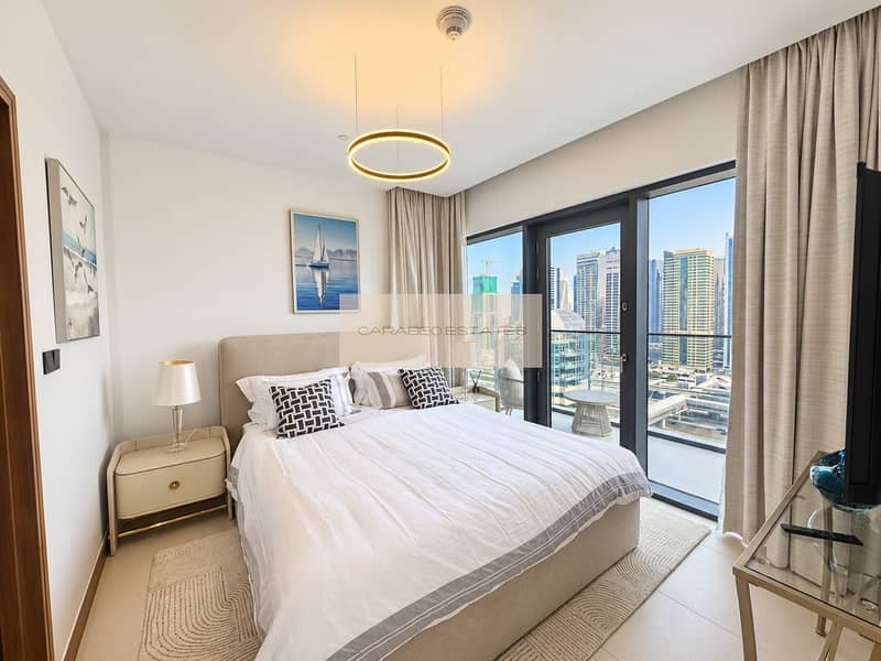 6 Bright bedroom with balcony city view. png
