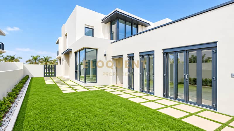 10 Modern Minimalist House with Lush Garden. png