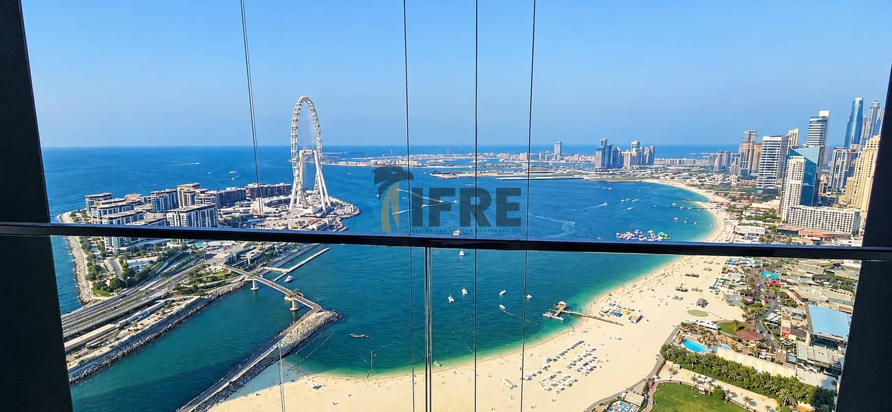2 Dubai Beachfront Panorama Through Glass. png