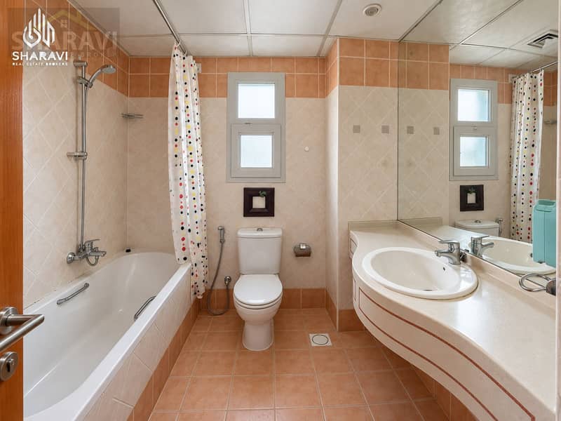 21 Classic Bathroom with Tub, Toilet, and Basin. png