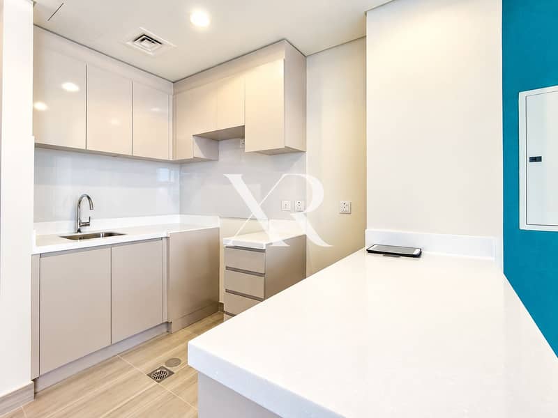5 Bright Minimalist L-Shaped Kitchen. png