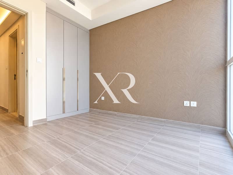 11 Minimalist Taupe Bedroom Interior. png