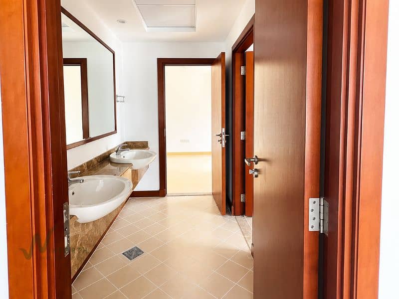 14 Bright Wood-Framed Vanity Corridor. png