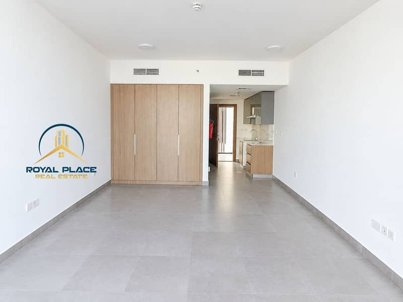 2 Minimalist Apartment with Wood Wardrobe and Kitchenette. png