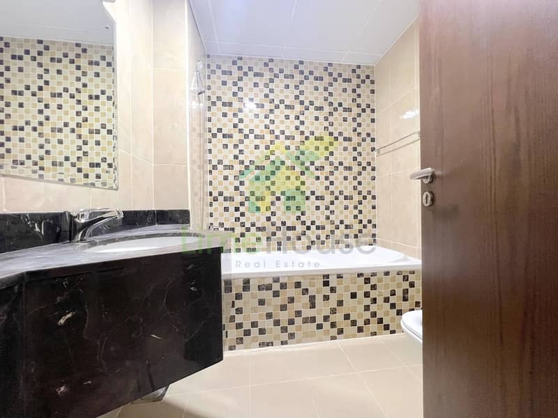 11 azizi-liatris-unit-310-master-bathroom-mosaic-tile-bathtub-marble-vanity-al-furjan-dubai. jpg