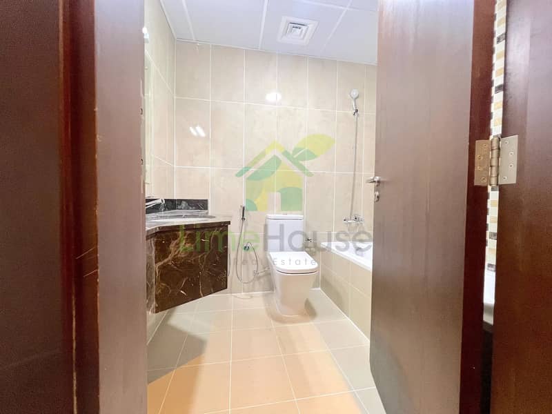 12 azizi-liatris-unit-310-second-bathroom-marble-vanity-bathtub-toilet-al-furjan-dubai. jpg